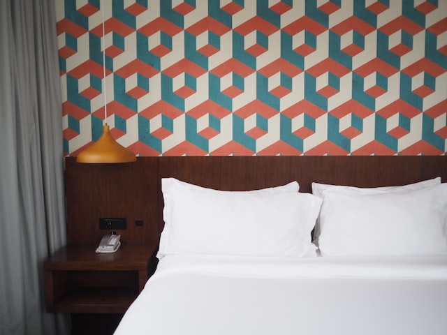 geometric pattern wallpaper inside a bedroom